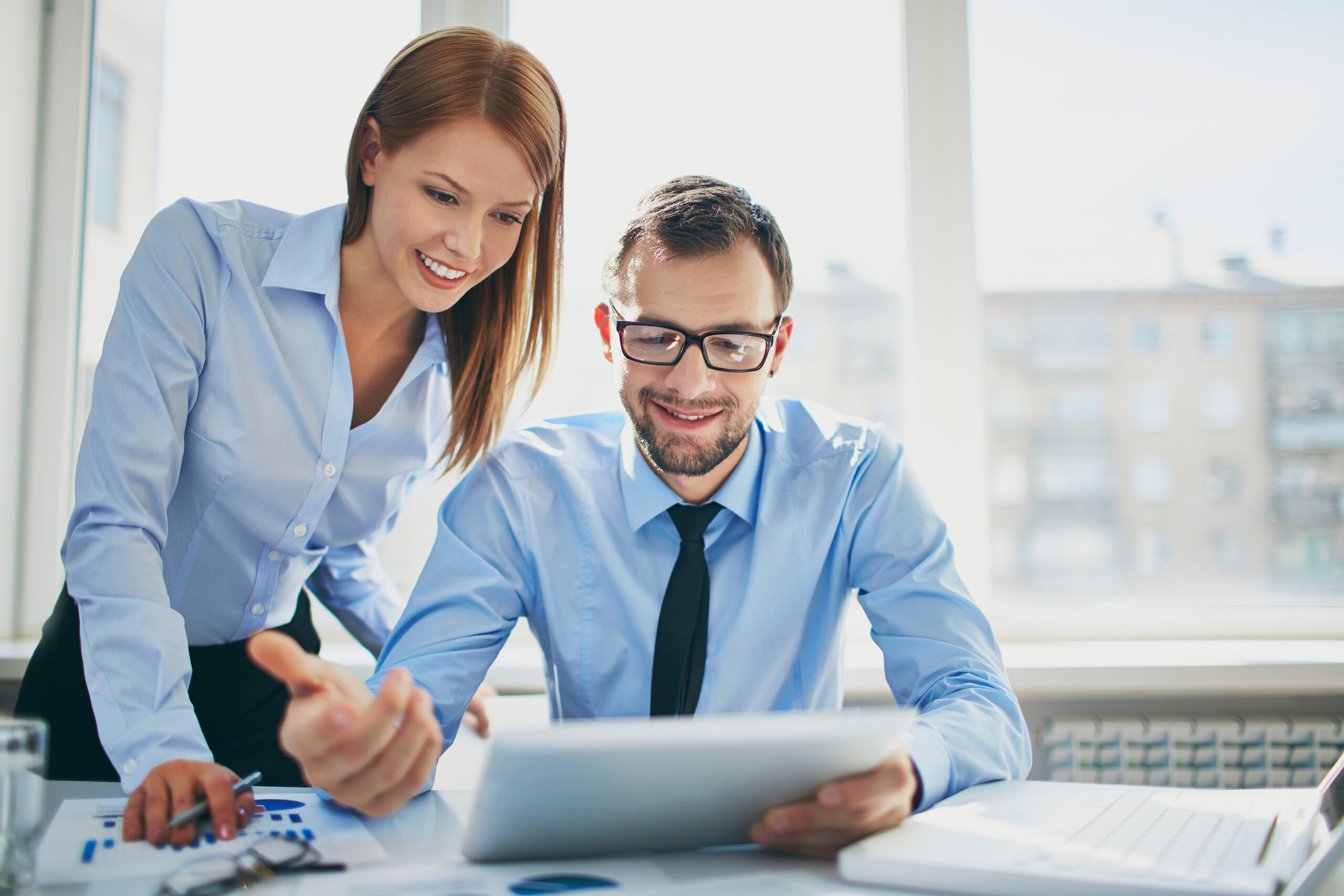 Two business people working